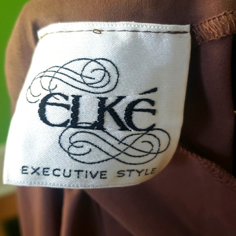 Ladies ELKE EXECUTIVE STYLE ,buttoned sleeve,halter type,dress.